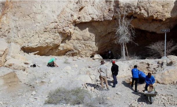 Researchers at Jabal Kaf Addor rock shelter in the Al Habhab region, UAE. Source: Fujairah Tourism & Antiquities Authority