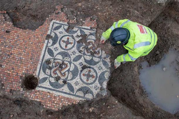 The mosaic unearthed in London incorporates flowers geometric patterns and a twisted-rope design. (Andy Choppin / MOLA)