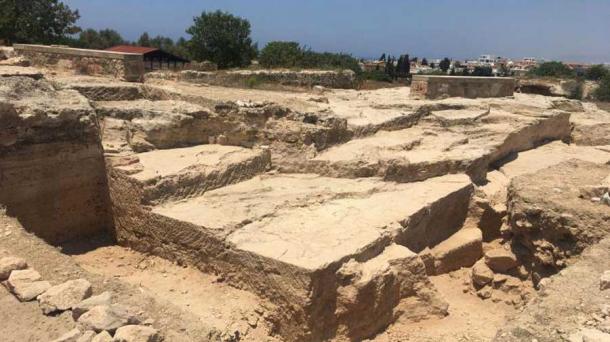 A view of the open-air banquet area (in the foreground) recently discovered carved in bedrock at the entrance to a collapsed ancient Paphos temple on Fabrica Hill. (Anna Kubicka / Nauka W Polsce)