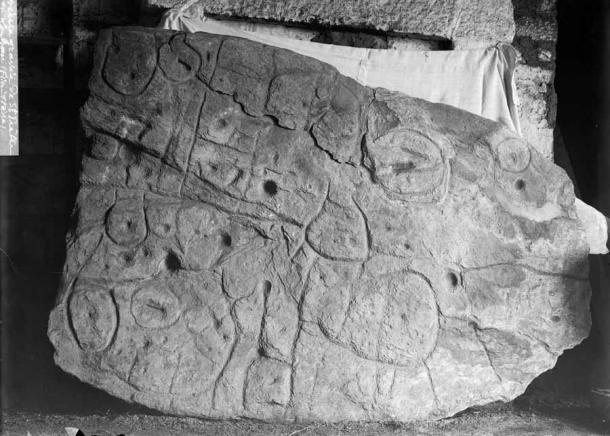 The first photograph of the Saint-Bélec slab, when it was found by Paul du Chatellier in Leuhan, Finistere, Brittany, France in 1900. (Inrap)