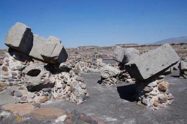 Megalithic stone blocks scattered in the vicinity of the pyramid of the Feathered Serpents at Teotihuacan.