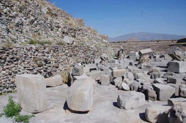 Megalithic stone blocks scattered in the vicinity of the pyramid of the Feathered Serpents at Teotihuacan.