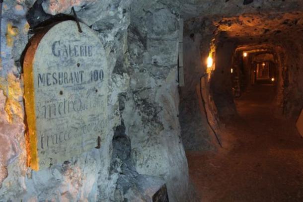 In the underground city of Naours, France.