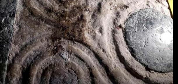 The uniquely elegant Cosmatesque decorative stonework motifs found on the other side of the stone slab found leaning against the wall in an obscure Church of the Holy Sepulchre corridor in Jerusalem. (YouTube screenshot / Reuters)